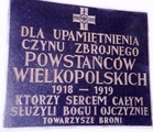 plac Zwycięstwa, kościół pw. św. Wojciecha, tablica Powstańców Wielkopolskich 1918-1919